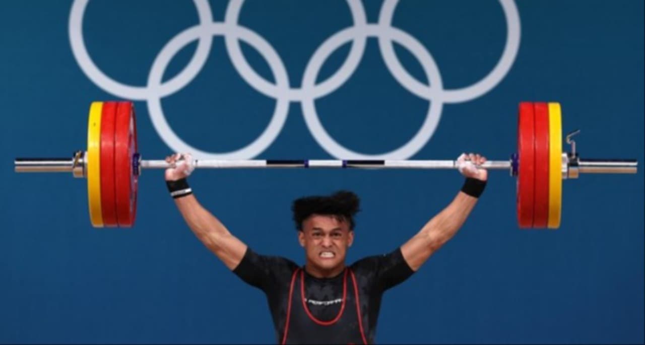 Pecahkan Rekor Olimpiade! Lifter Rizki Juniansyah Sabet Medali Emas Kedua